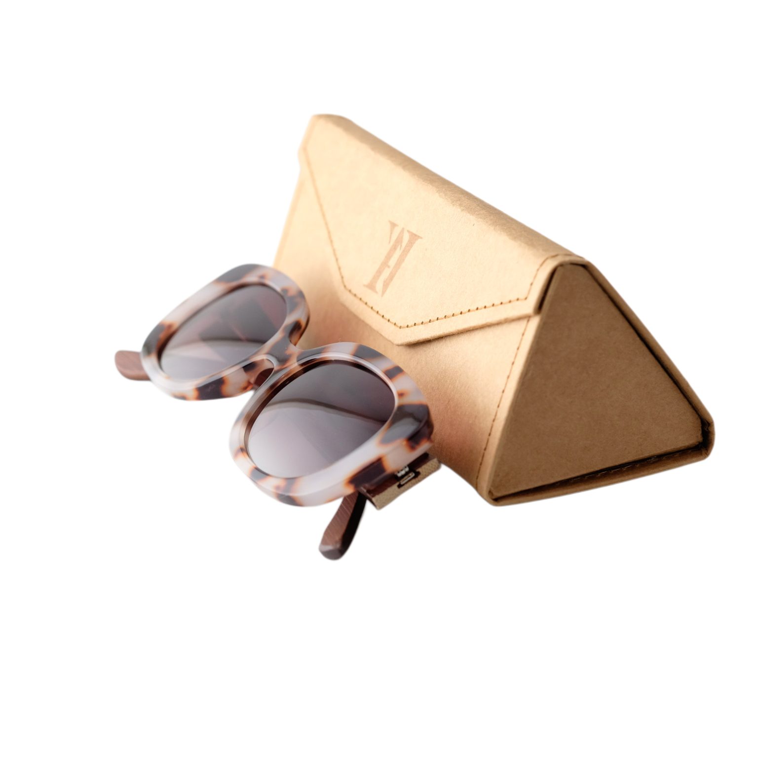 Bamboo sunglasses with tortoise style frame and brown lenses folded against case