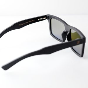 bamboo sunglasses on white background, with black arms and matte black frames. Arms read